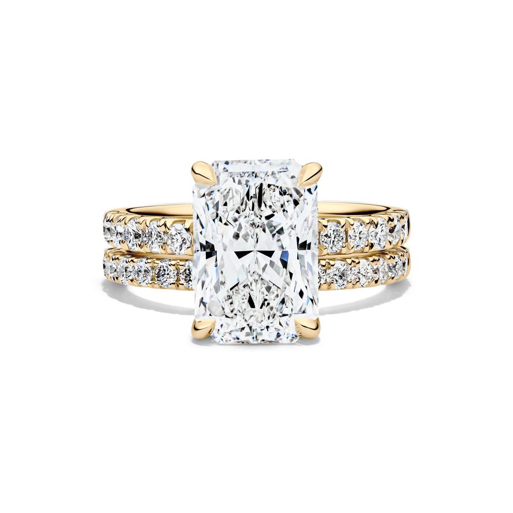 Radiant-cut diamond bridal ring with its matching diamond band