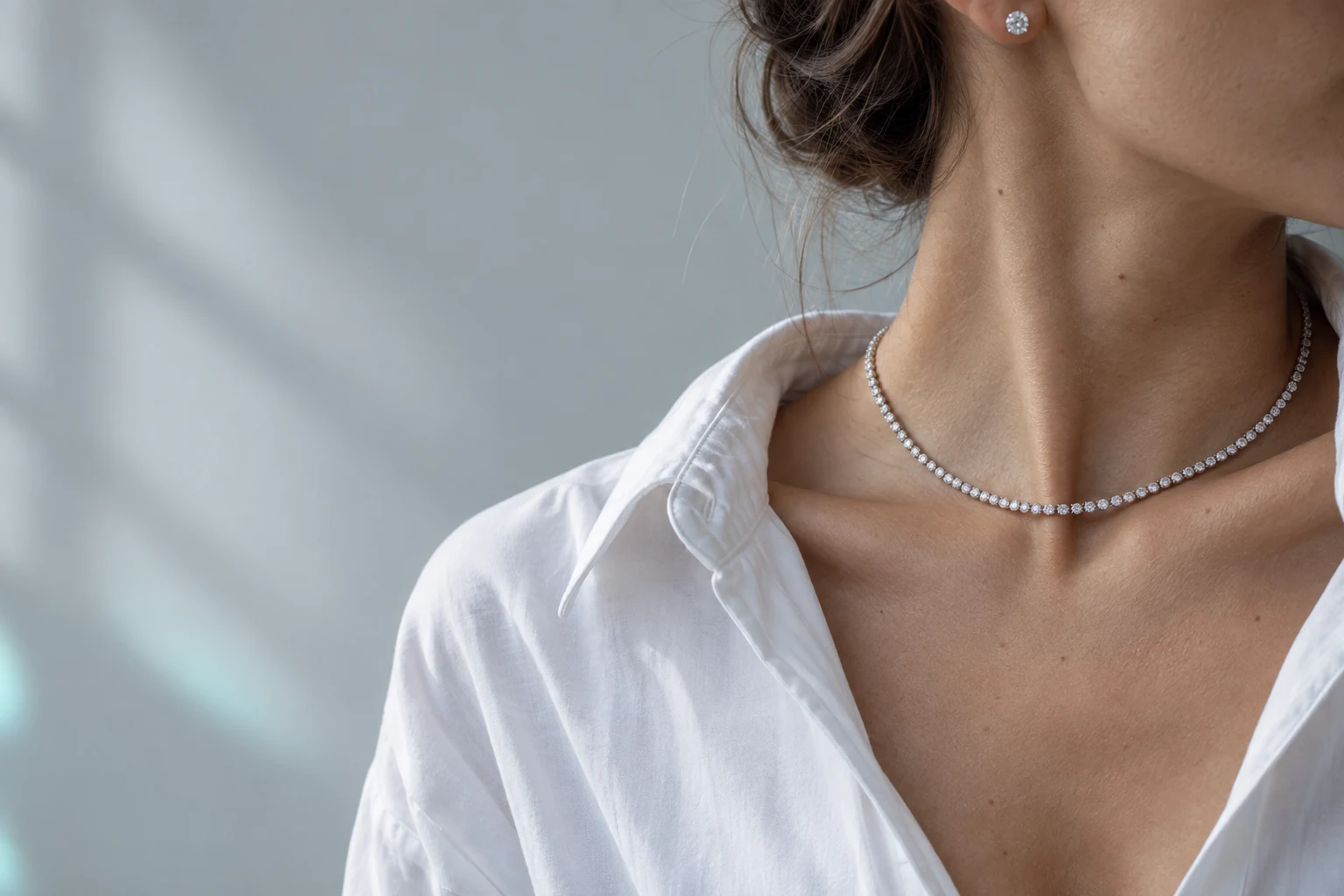 Diamond tennis necklace styled with a white cotton shirt